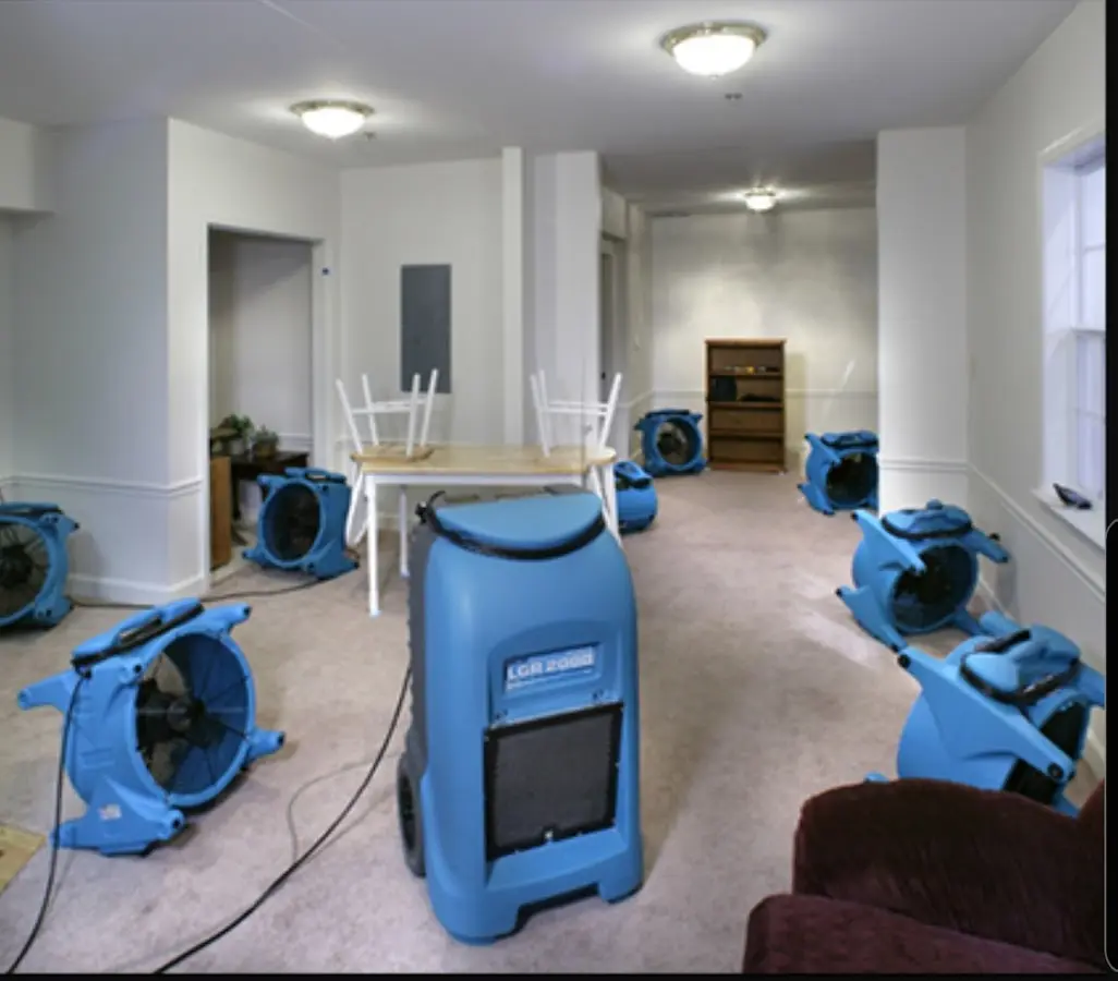 Air movers and dehumidifier setup for Water Damage Restoration in Bullard
